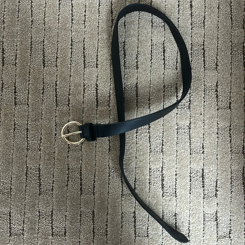 Gold circle black belt